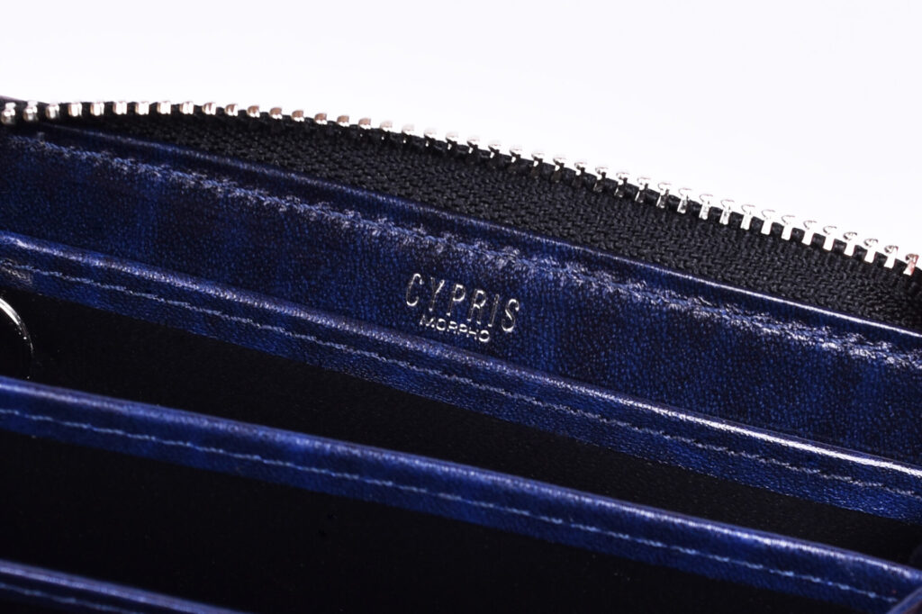 review-cypris-compact-all-in-bridle-leather-and-ruga-shoulder-leather-two-backside