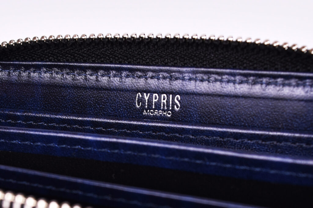 review-cypris-compact-all-in-bridle-leather-and-ruga-shoulder-logo